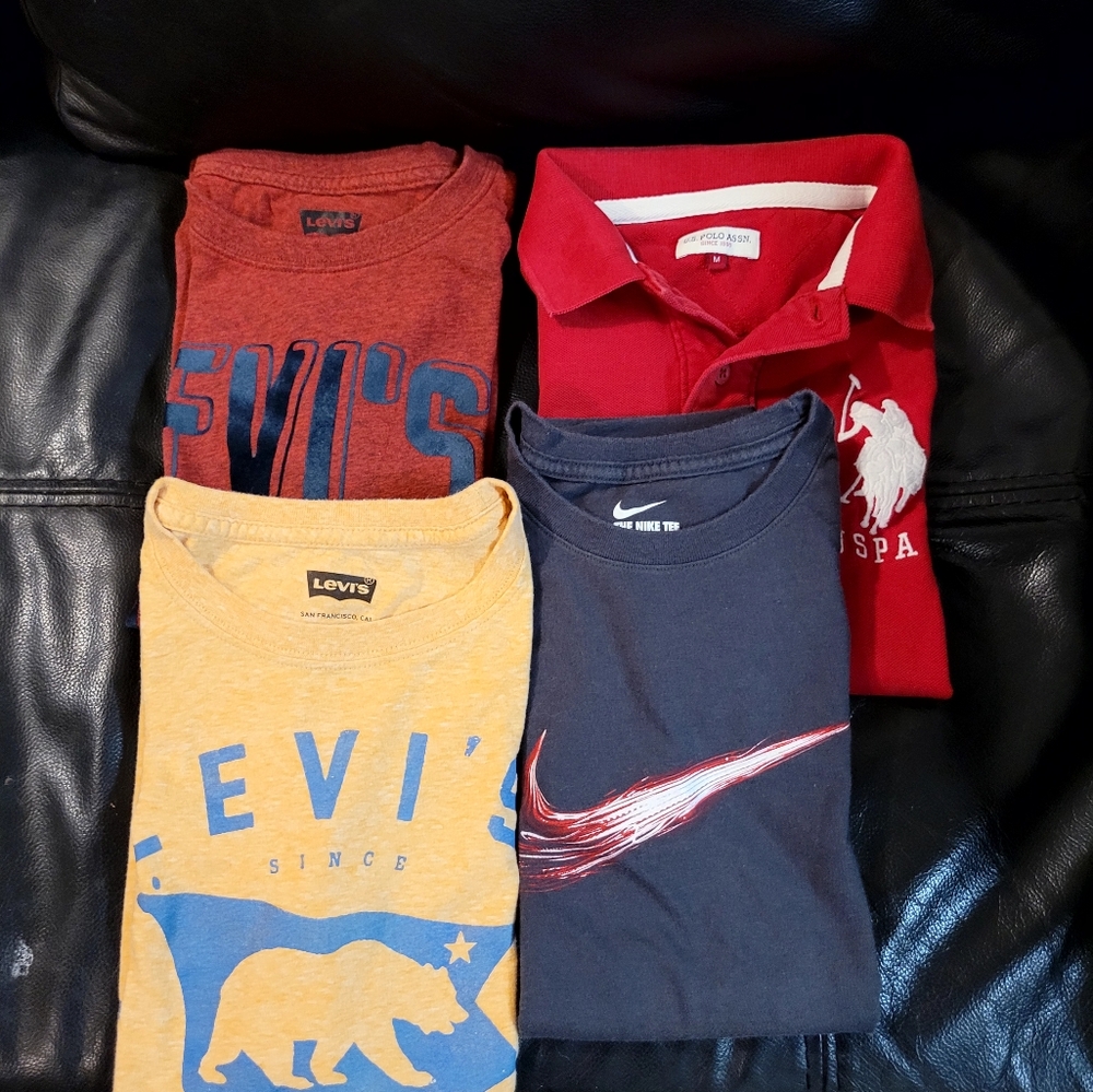 4 boys T Shirts size Medium in like new condition.